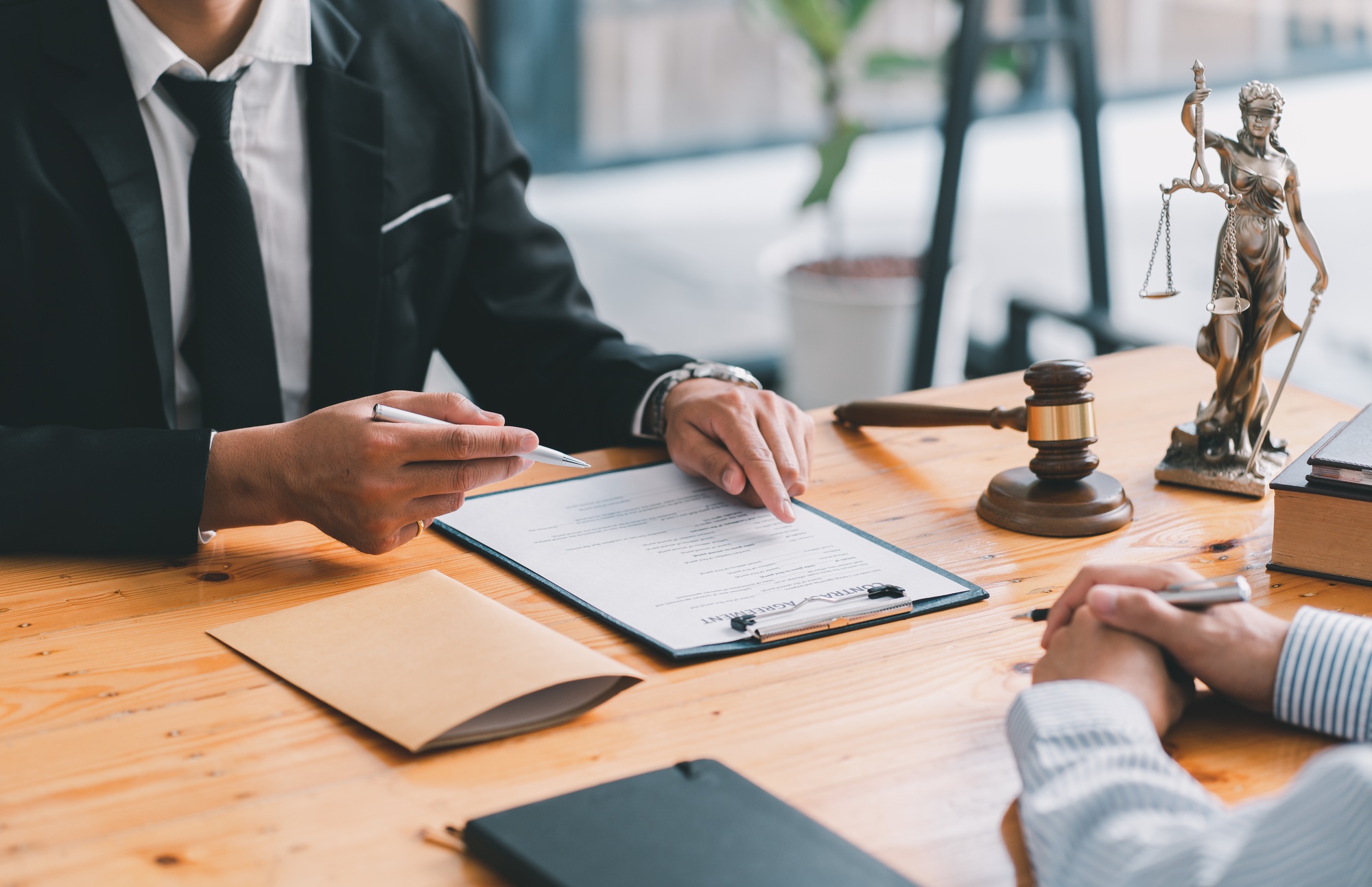 law concept The legal officer listening to the law report of booster and adjusting the agreement pap